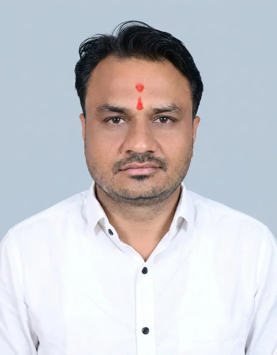 Portrait of Mr. Dinesh Khimji Karotra